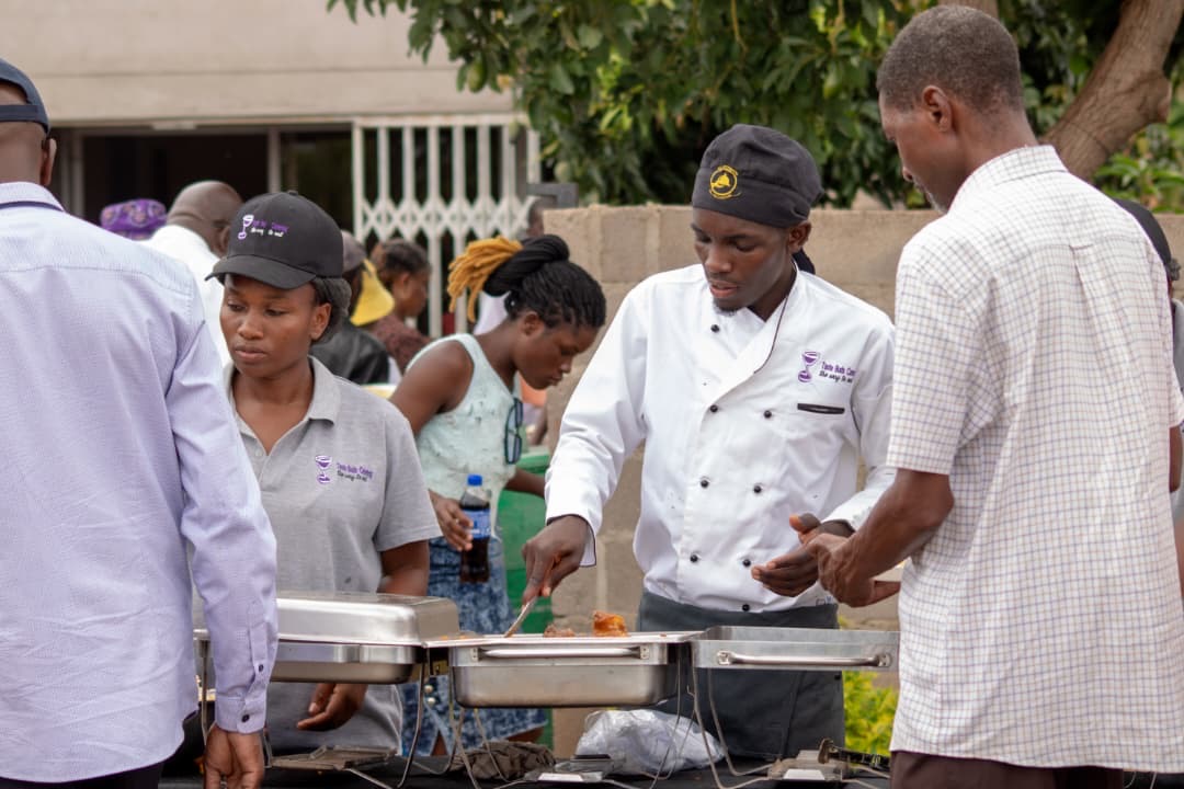 Chef carefully plating food