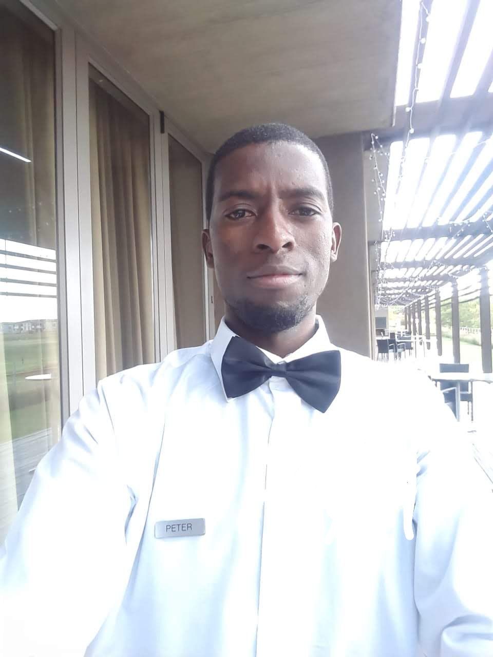 Waiter with a tray of drinks